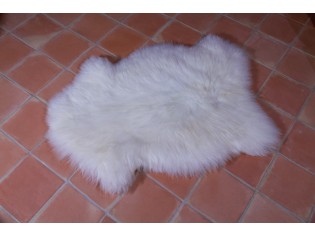 Peau de mouton blanc naturel: confort et élégance pour votre intérieur